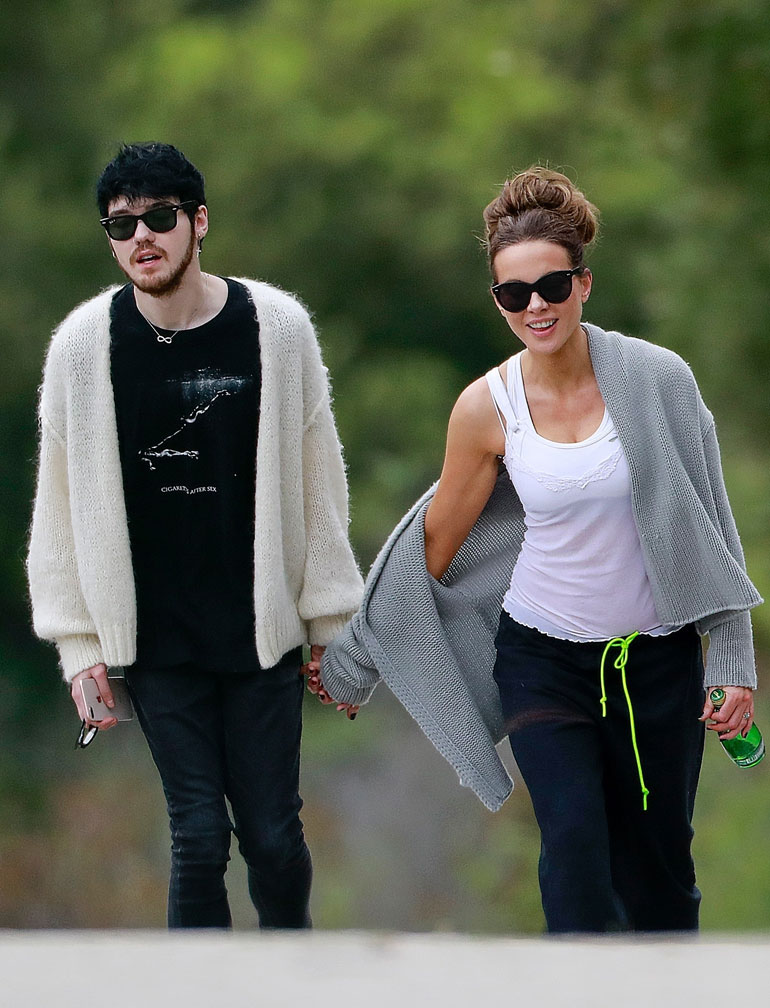 T on April 14, 2020** Kate Beckinsale walks hand in hand with 22 year old boyfriend, Goody Grace! The 46 year old actress was seen taking a break from quarantine Sunday afternoon with the young musician. Kate was first spotted with with Goody Grace back in January as the two were seen leaving a party together.