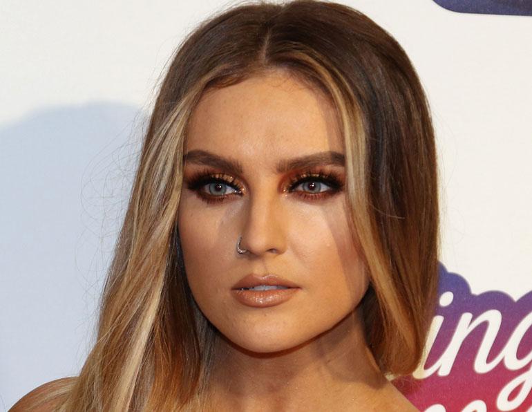 Perrie Edwards poseeraa Lontoossa joulukuussa 2016