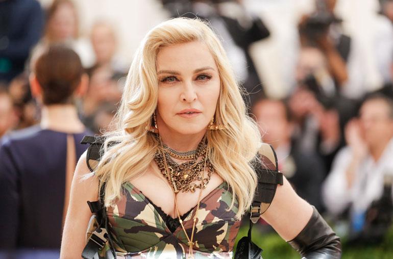 Madonna yllätettiin meikittömänä.