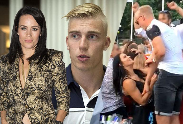 Martina Aitolehti repi Rasmus Ristolaisen paidan napit.