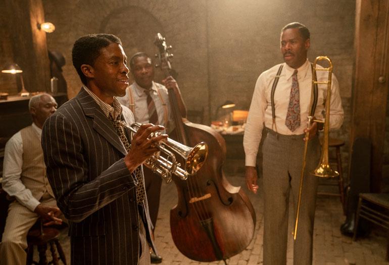MA RAINEY'S BLACK BOTTOM, from left: Glynn Turman, Chadwick Boseman, Michael Potts, Colman Domingo, 2020. ph: David Lee / © Netflix / Courtesy Everett Collection